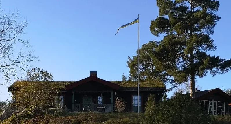 Villa med svensk flagga